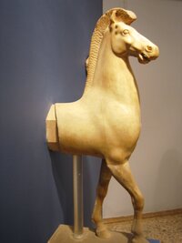 a její kůň o celou svou záď,