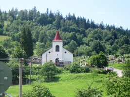 hřbitovní kapli má v opozici