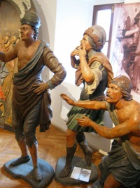 a nakonec skupina prosebníků a truchlících